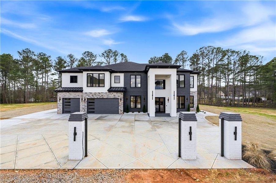 Front exterior of a new home in , Buford, GA, highlighting curb appeal (Image 30).