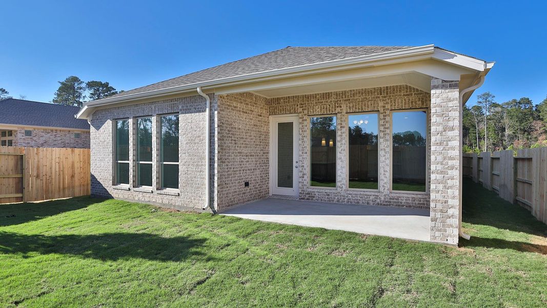 Exterior details and patio area of a home in Artavia 45', Conroe (Image 3).