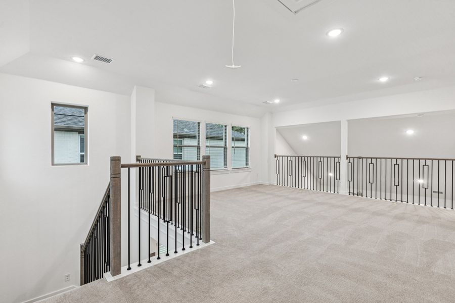 Game Room in the Picasso II home plan by Trophy Signature Homes – REPRESENTATIVE PHOTO