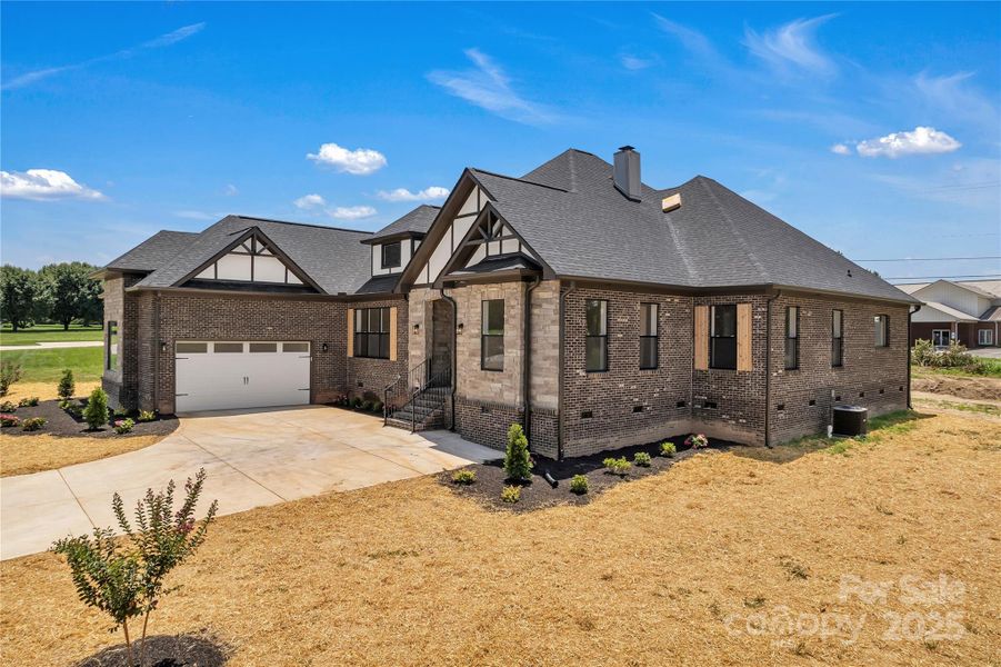 Front exterior of a new home in , Kings Mountain, NC, highlighting curb appeal (Image 26).