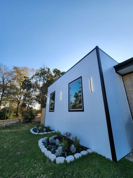 Exterior details and patio area of a home in , Houston (Image 35). Exterior details and patio area of a home in , Houston (Image 35).