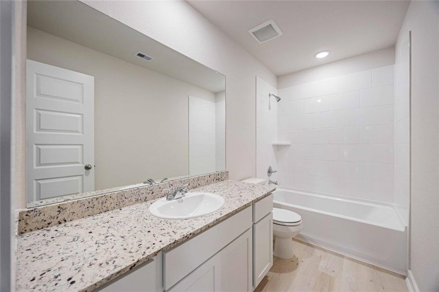 Furnished interior view inside a new home in Bluebonnet Village, Bellville (Image 9).