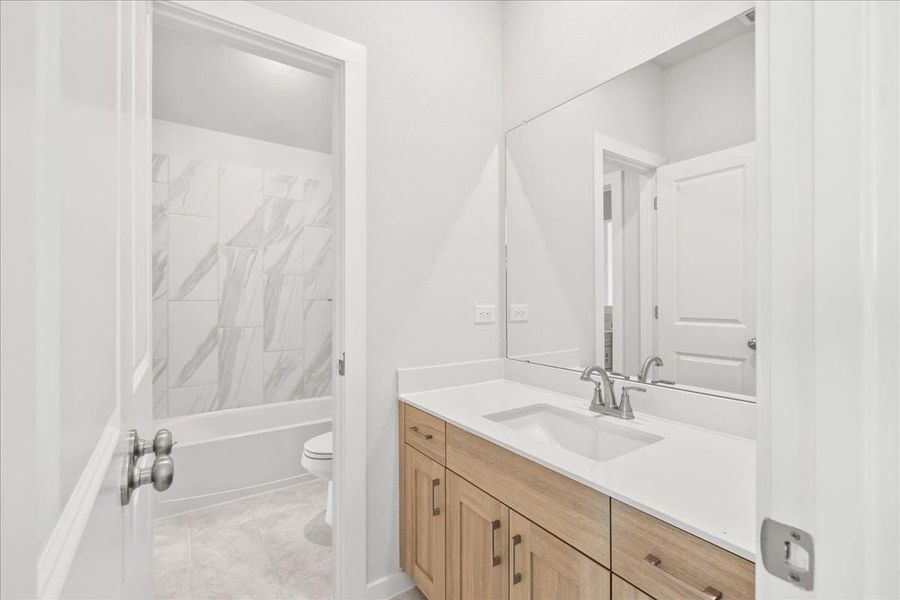 Furnished interior view inside a new home in Trace, San Marcos (Image 12).