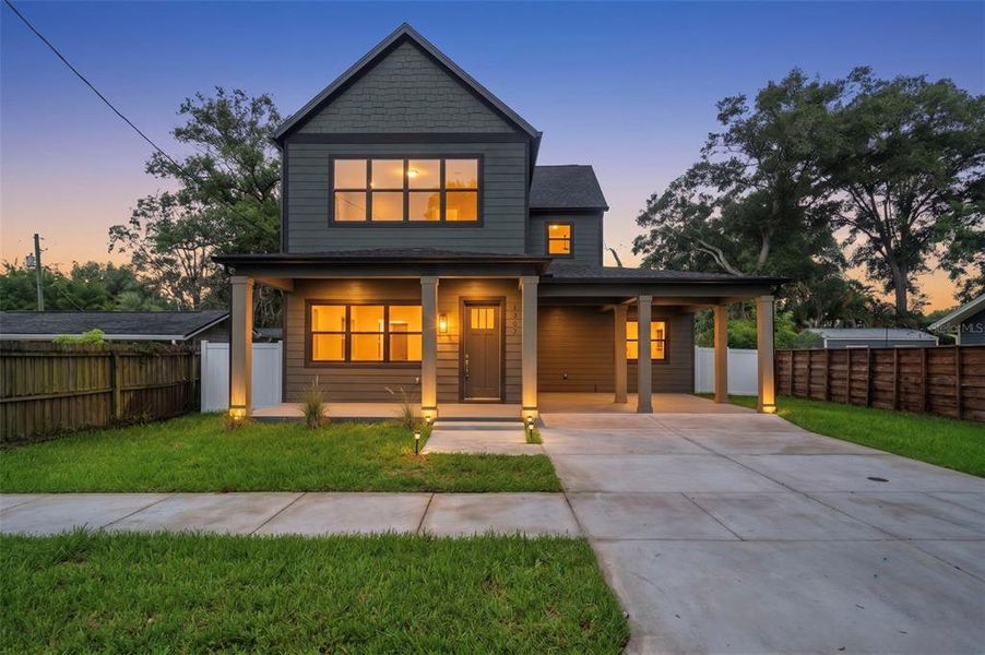 Front exterior of a new home in , Tampa, FL, highlighting curb appeal (Image 29).