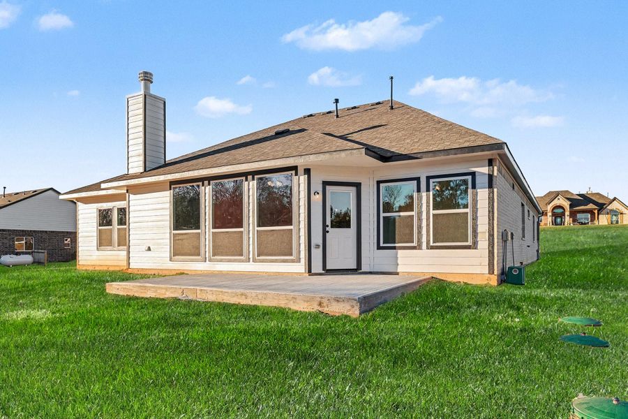 Exterior details and patio area of a home in Rose Hill Estates, Willis (Image 22).