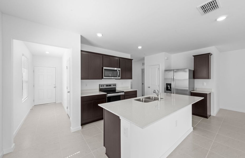 Furnished interior view inside a new home in Caloosa Cove, Labelle (Image 6).