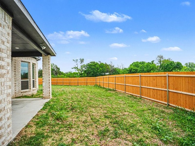 Exterior details and patio area of a home in Ten Mile Creek Estates, DeSoto (Image 3). Exterior details and patio area of a home in Ten Mile Creek Estates, DeSoto (Image 3).