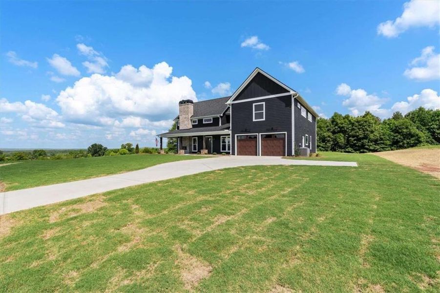 Front exterior of a new home in , Roopville, GA, highlighting curb appeal (Image 30).