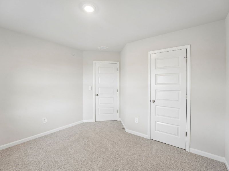 Spacious, unfurnished interior of a new home in Hemingway - Highland Series, Cumming (Image 23).