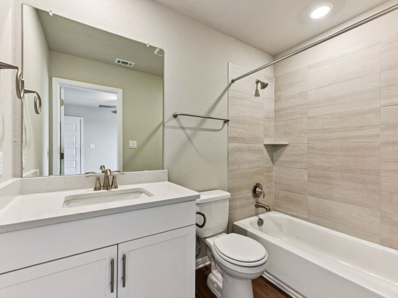 Furnished interior view inside a new home in Big Sky Ranch - Executive Collection, Dripping Springs (Image 7).