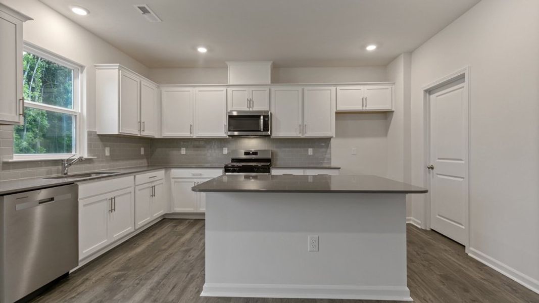 Representative furnished interior of a home built from the hanover by D.R. Horton in Bexford, Willow Spring (Image 6).