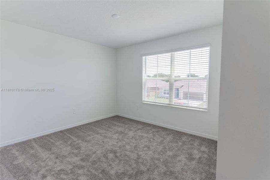 Spacious, unfurnished interior of a new home in Inman Groves, Winter Haven (Image 35). Spacious, unfurnished interior of a new home in Inman Groves, Winter Haven (Image 35).