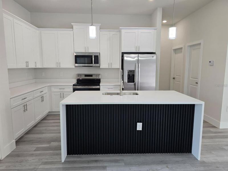 Furnished interior view inside a new home in , Port Charlotte (Image 12).
