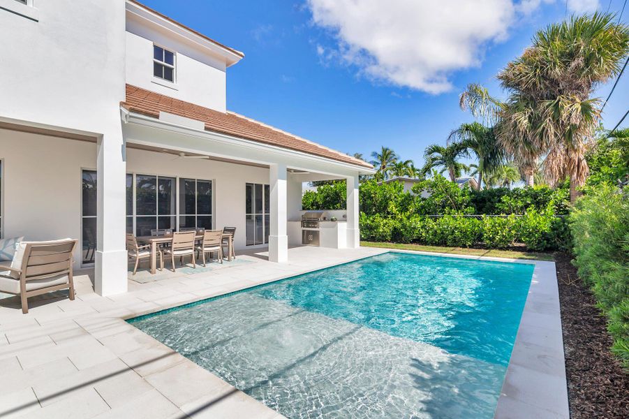 Exterior details and patio area of a home in , West Palm Beach (Image 3).