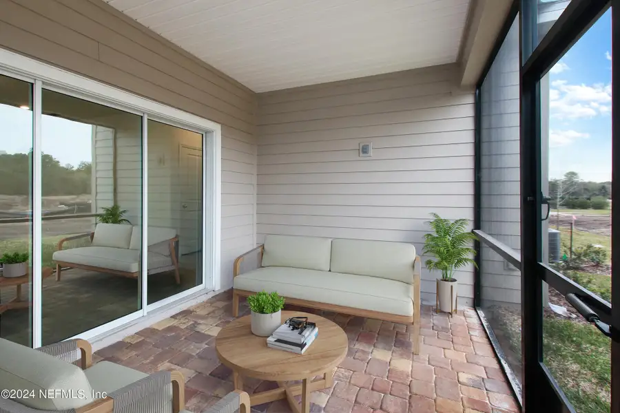 Exterior details and patio area of a home in Silver Falls Single Family at SilverLeaf, St. Augustine (Image 3).