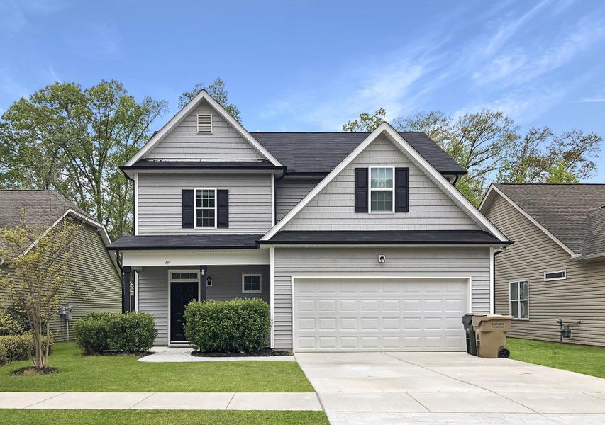 Representative exterior photo of a completed home built from the Stewart by RiverWILD Homes in Harvest Meadows, Zebulon, NC (Image 1). Representative exterior photo of a completed home built from the Stewart by RiverWILD Homes in Harvest Meadows, Zebulon, NC (Image 1).