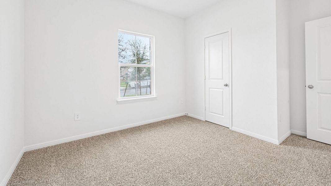 Spacious, unfurnished interior of a new home in Bar W Ranch, Leander (Image 24).