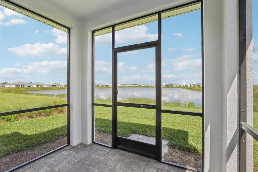 Exterior details and patio area of a home in Crescent Lakes - Premier Series, Punta Gorda (Image 4).