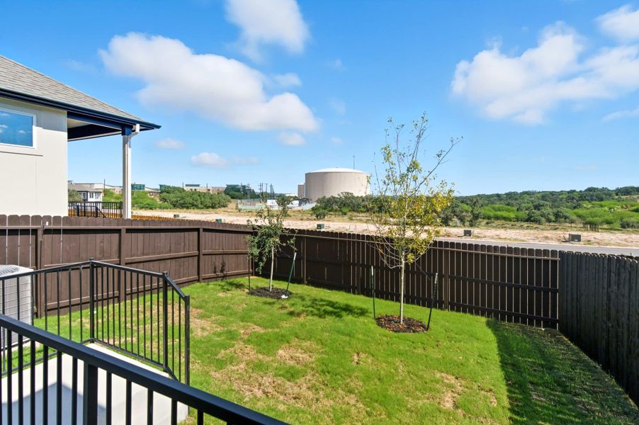 Exterior details and patio area of a home in Centero at Stone Oak, San Antonio (Image 4).