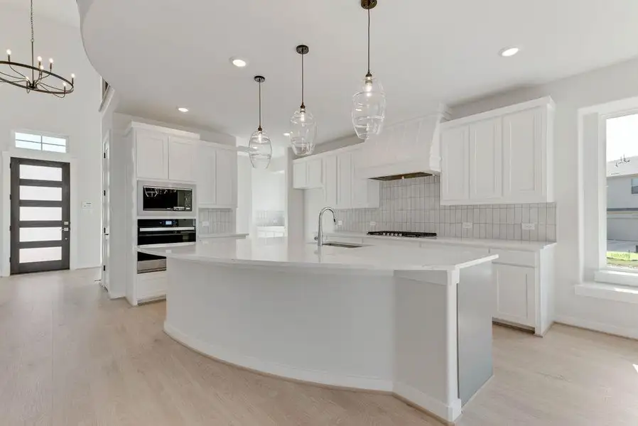 Furnished interior view inside a new home in Trails at Cottonwood Creek, Rowlett (Image 4).