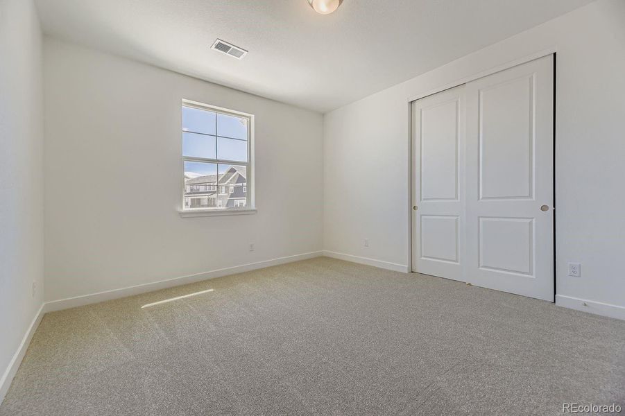 Spacious, unfurnished interior of a new home in Macanta: The Grand Collection, Castle Rock (Image 9).