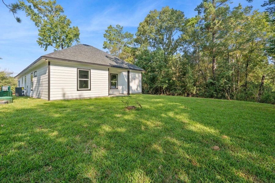 Exterior details and patio area of a home in , Willis (Image 4). Exterior details and patio area of a home in , Willis (Image 4).