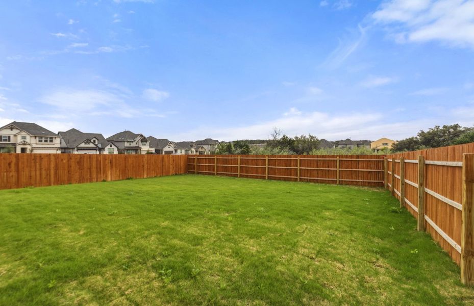 Exterior details and patio area of a home in Saddleback at Santa Rita Ranch, Liberty Hill (Image 3).