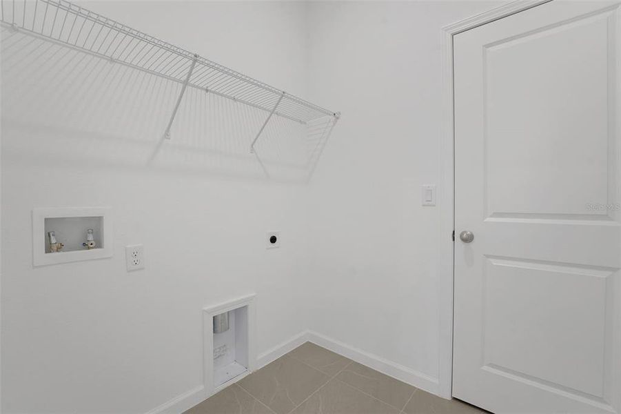 Furnished interior view inside a new home in Annabelle Estates, Winter Haven (Image 14).
