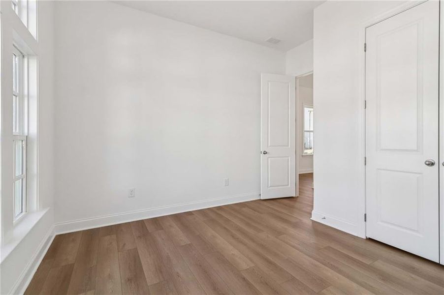 Spacious, unfurnished interior of a new home in East Harbor II at Chestatee, Dawsonville (Image 46).