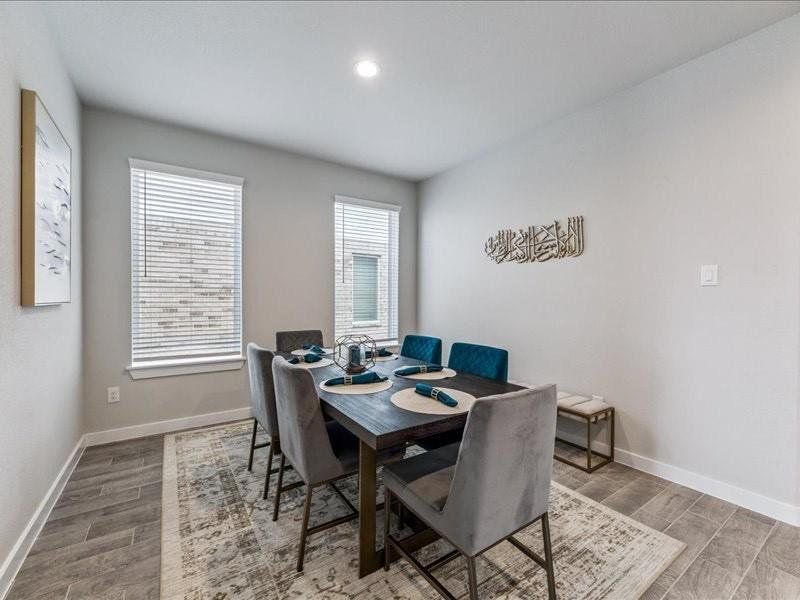Furnished interior view inside a new home in Champions Oak, Houston (Image 1).