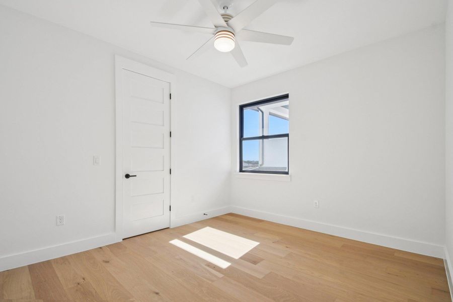 Spacious, unfurnished interior of a new home in Milky Way at River Place, Austin (Image 25).
