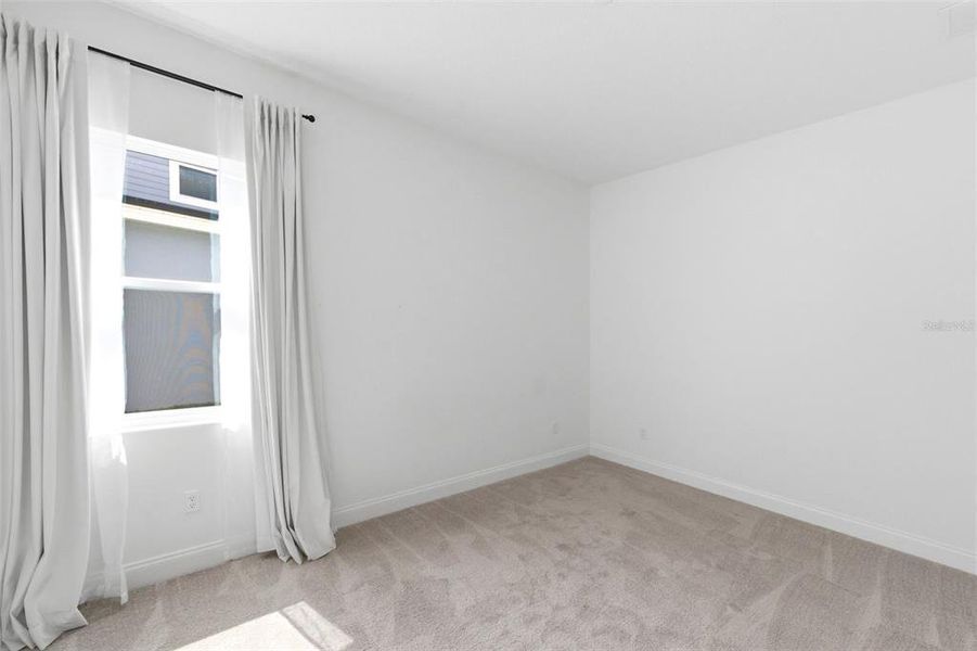 Spacious, unfurnished interior of a new home in Tamarack at Two Rivers, Zephyrhills (Image 23).