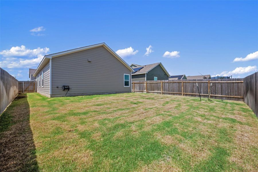 Front exterior of a new home in Bastrop Grove: Cottage Collection, Bastrop, TX, highlighting curb appeal (Image 20). Front exterior of a new home in Bastrop Grove: Cottage Collection, Bastrop, TX, highlighting curb appeal (Image 20).