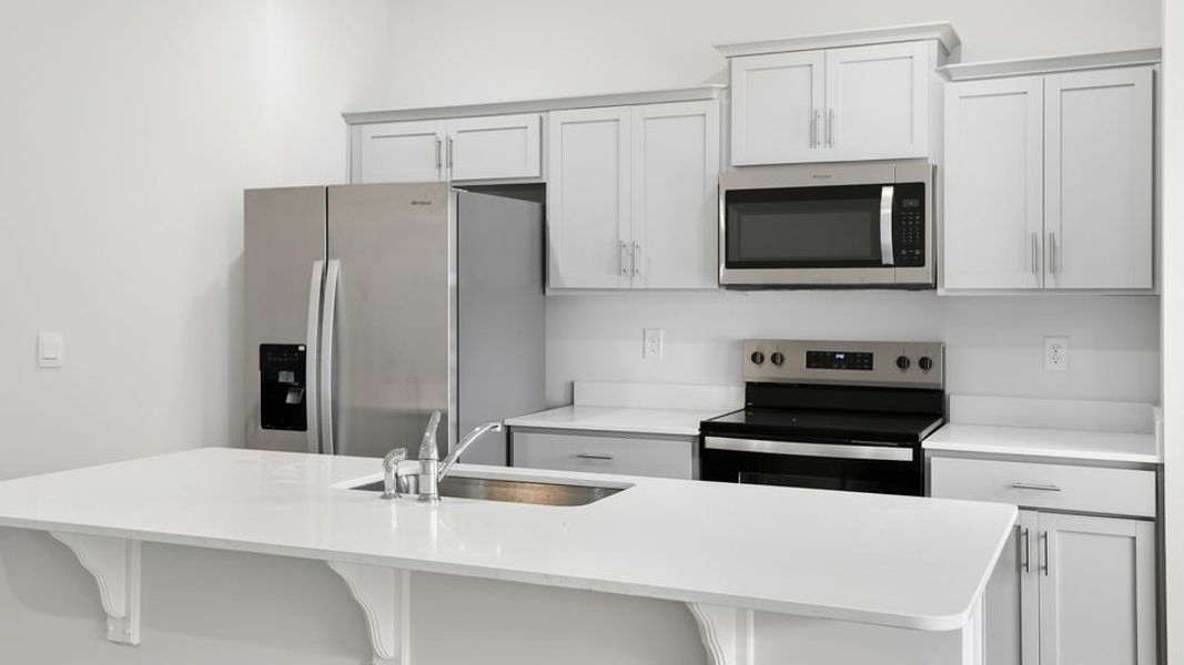 Furnished interior view inside a new home in Tanglewood Townes, Greenville (Image 10).
