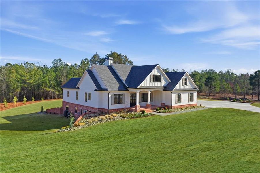Front exterior of a new home in , White, GA, highlighting curb appeal (Image 35). Front exterior of a new home in , White, GA, highlighting curb appeal (Image 35).