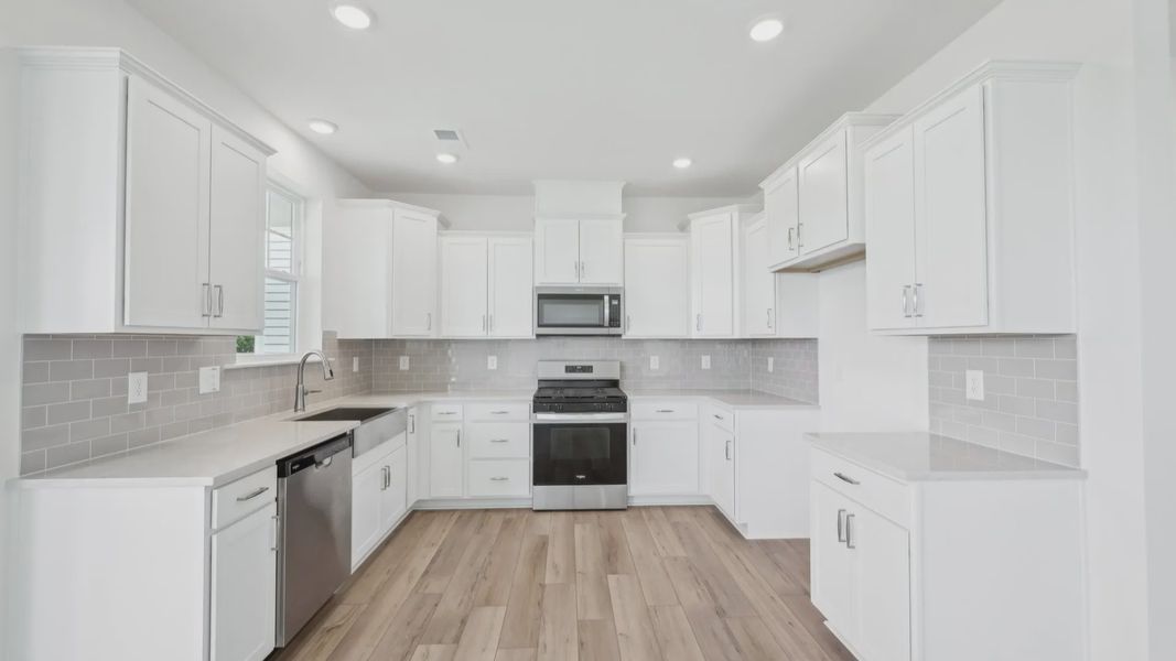 Furnished interior view inside a new home in Sidney Creek Single Family, Zebulon (Image 10).