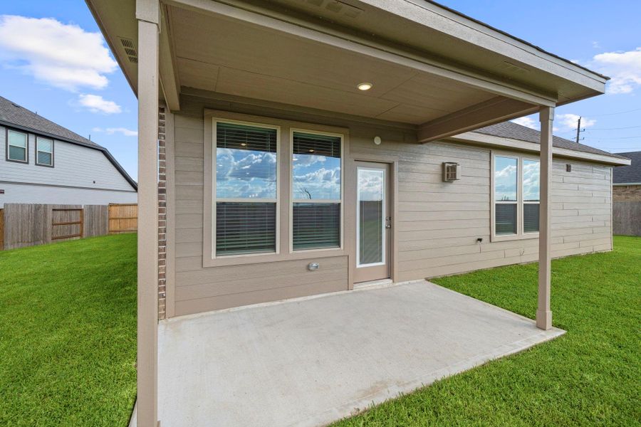 Exterior details and patio area of a home in Arabella on the Prairie, Richmond (Image 3). Exterior details and patio area of a home in Arabella on the Prairie, Richmond (Image 3).
