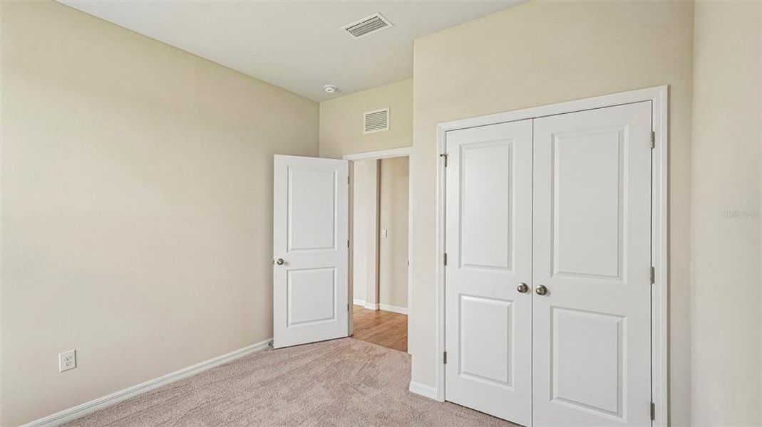 Spacious, unfurnished interior of a new home in Legacy Preserve, Parrish (Image 23). Spacious, unfurnished interior of a new home in Legacy Preserve, Parrish (Image 23).