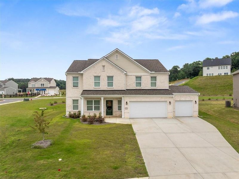 Front exterior of a new home in , Calhoun, GA, highlighting curb appeal (Image 2). Front exterior of a new home in , Calhoun, GA, highlighting curb appeal (Image 2).