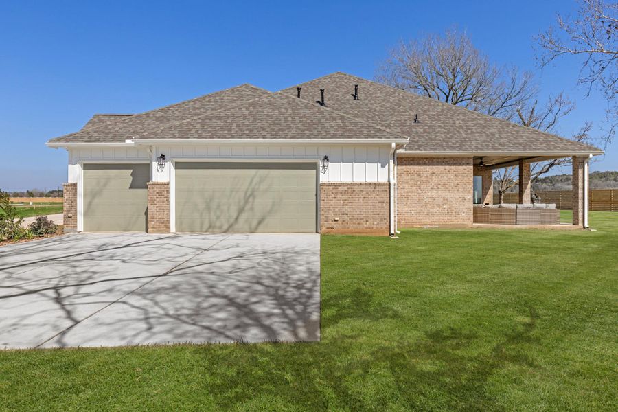Front exterior of a new home in , Smithville, TX, highlighting curb appeal (Image 21). Front exterior of a new home in , Smithville, TX, highlighting curb appeal (Image 21).