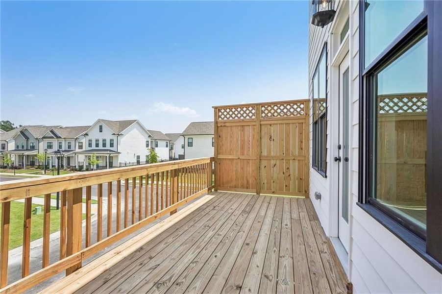 Exterior details and patio area of a home in Millcroft Townhomes, Buford (Image 4). Exterior details and patio area of a home in Millcroft Townhomes, Buford (Image 4).