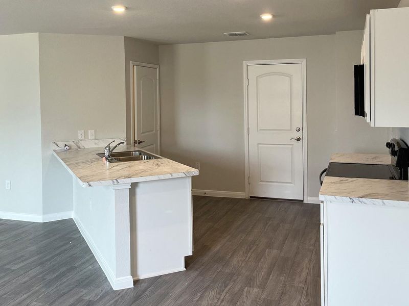 Furnished interior view inside a new home in Santa Fe, Cleveland (Image 3).