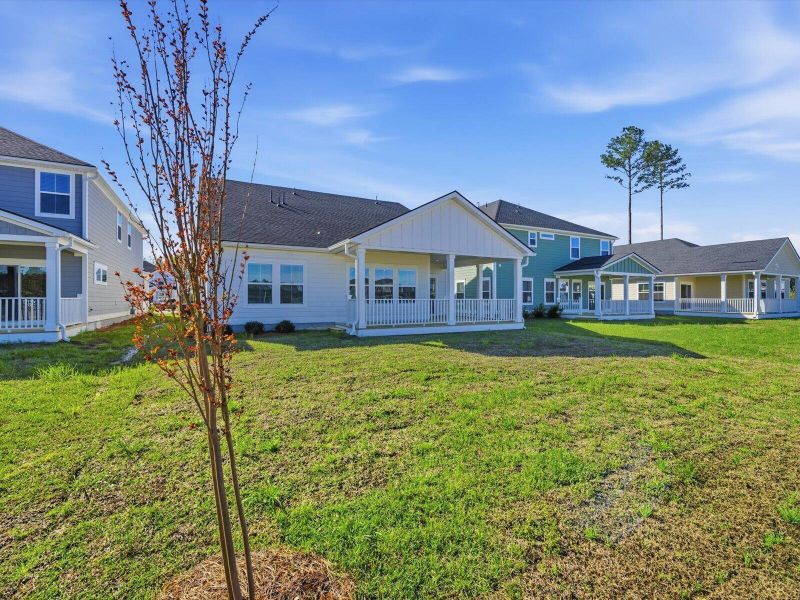 Exterior details and patio area of a home in The Coves at Lakes of Cane Bay, Summerville (Image 4).