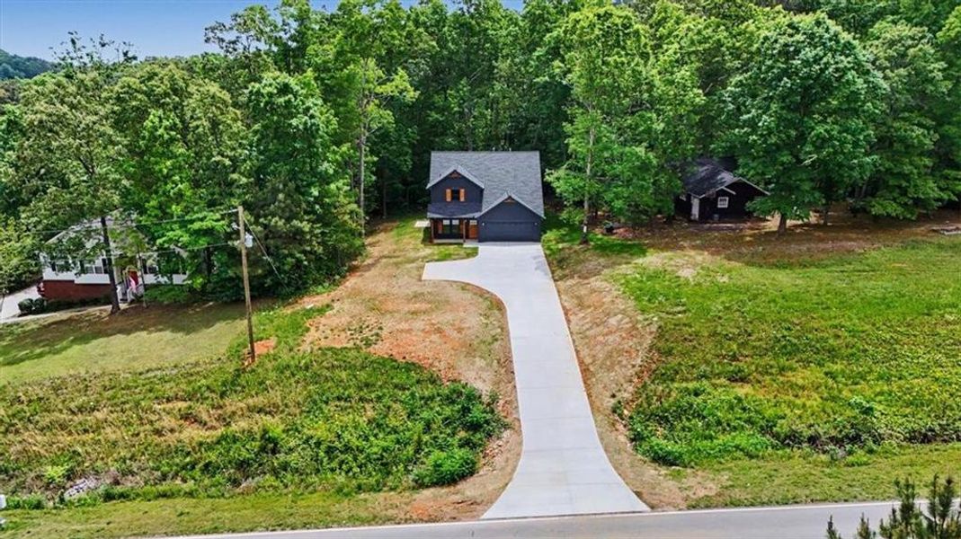 Front exterior of a new home in , Emerson, GA, highlighting curb appeal (Image 18).