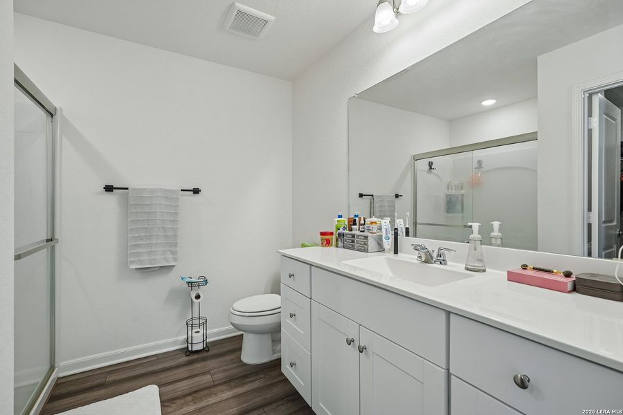 Furnished interior view inside a new home in Hennersby Hollow, San Antonio (Image 17).