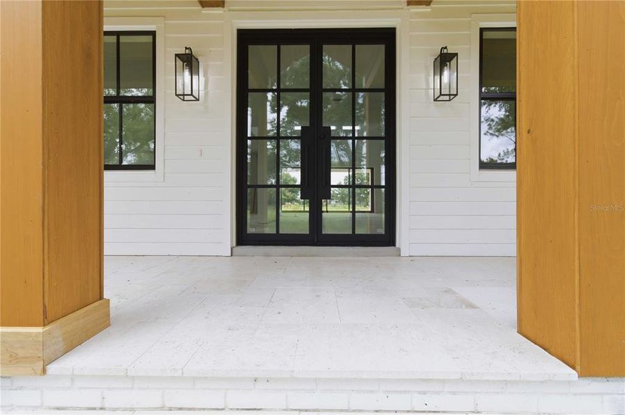 Exterior details and patio area of a home in , Sarasota (Image 11).