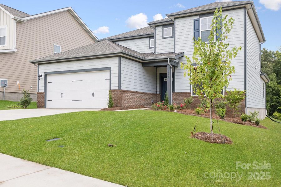 Front exterior of a new home in Cannon Manor, Kannapolis, NC, highlighting curb appeal (Image 15).