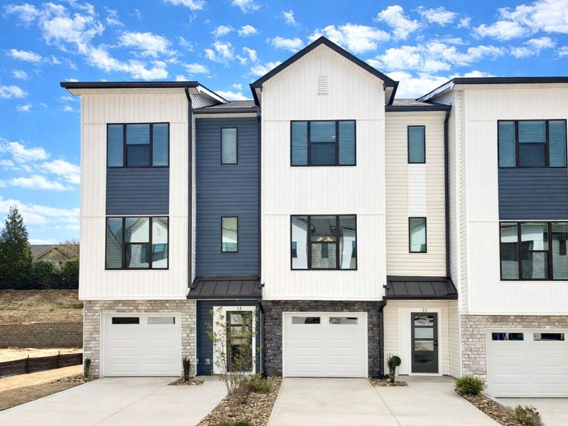 Front exterior of a new home in Holly View, Greenville, SC, highlighting curb appeal (Image 1). Front exterior of a new home in Holly View, Greenville, SC, highlighting curb appeal (Image 1).