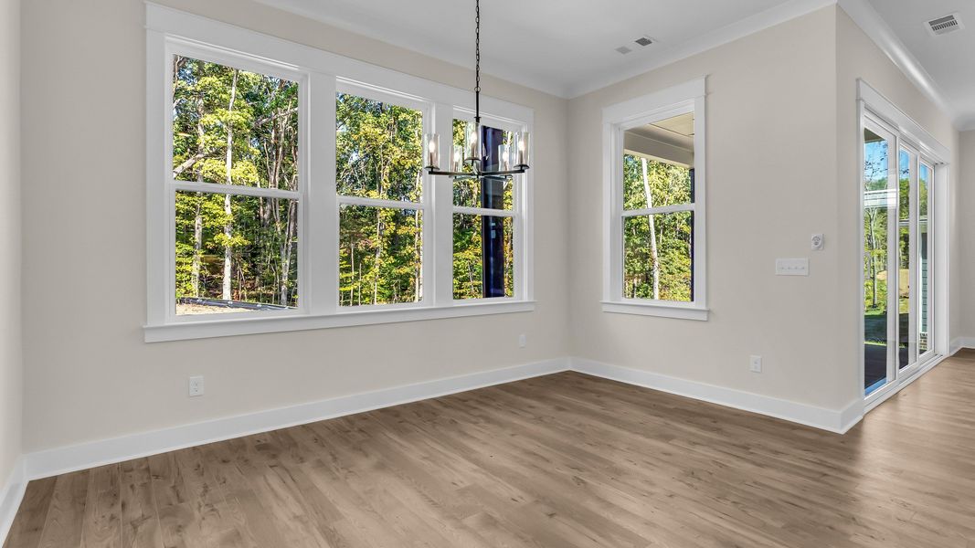 Dedicated dining area near the kitchen and back patio