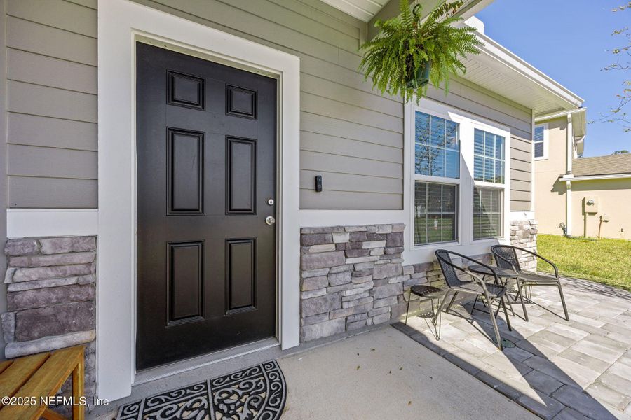 Exterior details and patio area of a home in Wilford Preserve, Orange Park (Image 23). Exterior details and patio area of a home in Wilford Preserve, Orange Park (Image 23).